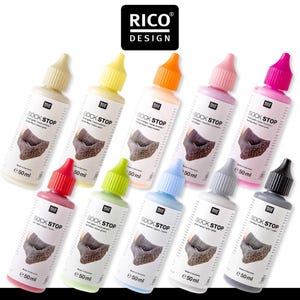 May include: Ten bottles of sock stop yarn dye in various colors, including pink, orange, yellow, green, blue, gray, and black. Each bottle is labeled "Sock Stop" and contains 50 ml of dye.