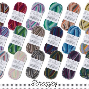 Puede incluir: Una colección de 18 ovillos de hilo Scheepjes Downtown en varias combinaciones de colores. Cada ovillo presenta un patrón a rayas con diferentes colores.