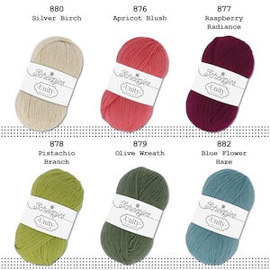 May include: Assortment of ten skeins of Scheepjes Unity yarn in various colours, including silver birch, apricot blush, raspberry radiance, pistachio branch, olive wreath, and blue flower haze.