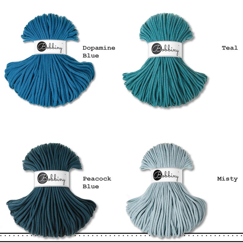 May include: Four hanks of braided cord arranged in a grid, each secured with a white paper band labeled Bobbiny. The colors are Dopamine Blue, Teal, Peacock Blue, and Misty. Each hank features a consistent braided texture and a fan-like shape.
