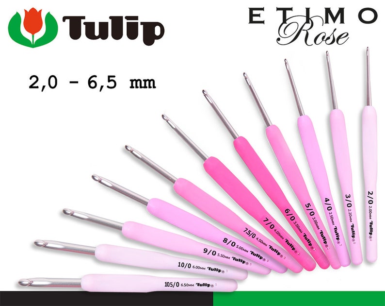 May include: A set of ten pink crochet hooks with silver tips, ranging in size from 2.00 mm to 6.50 mm. The hooks are labeled with their size and the brand "Tulip".