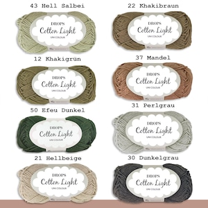 May include: Eight skeins of Drops Cotton Light yarn in various colors, including green, brown, beige, and gray. Each skein has a label with the brand name "DROPS" and the yarn name "Cotton Light".