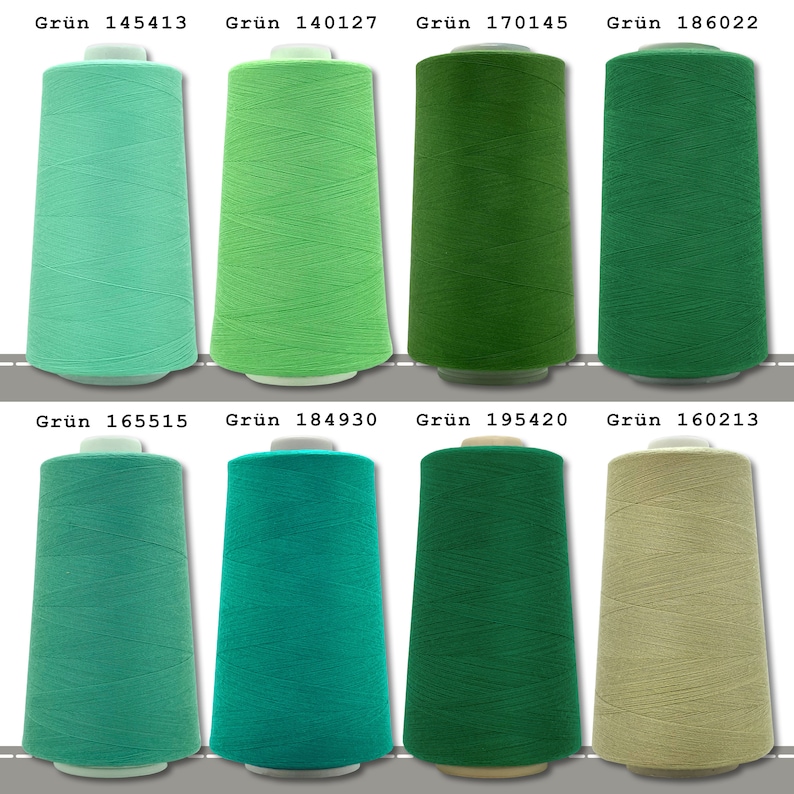 May include: Eight spools of thread in various shades of green, teal, and beige. The spools are labeled with the color "Gr&uuml;n" and a number.