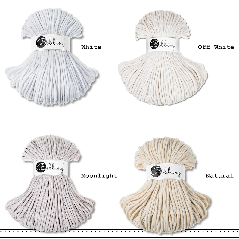 May include: Four bundles of Bobbiny cord arranged in a grid. The colors are labeled as White, Off White, Moonlight, and Natural. Each bundle is secured with a white paper band featuring the Bobbiny logo, showcasing a smooth, braided texture.