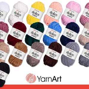 May include: A collection of 18 skeins of yarn in various colors, including black, white, red, blue, green, yellow, and brown. Each skein is labeled "YarnArt Dolce Maxi".