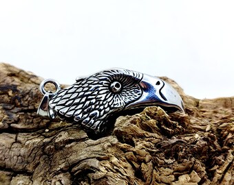 Stainless Steel Eagle Profile Pendant: Symbolic Jewelry, Cord Included