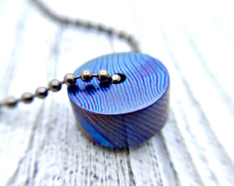Titanium Damascus Cylinder Pendant on Titanium Chain: A Striking EDC Necklace in Mokuti Steel, Rainbow Titanium, and Zircuti Jewelry