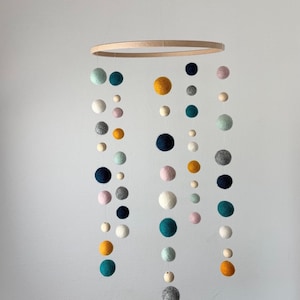 Handmade baby mobile with colorful felt balls | lovely nursery decor & unique gift idea for newborns