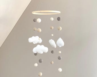 Handmade baby mobile with felt clouds in natural tones | lovely nursery decor & unique gift idea for a newborn