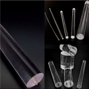 May include: A collection of clear acrylic rods of varying lengths and diameters. The rods are cylindrical with flat, polished ends. The image shows several rods arranged against a black background, highlighting their transparency and smooth surfaces.