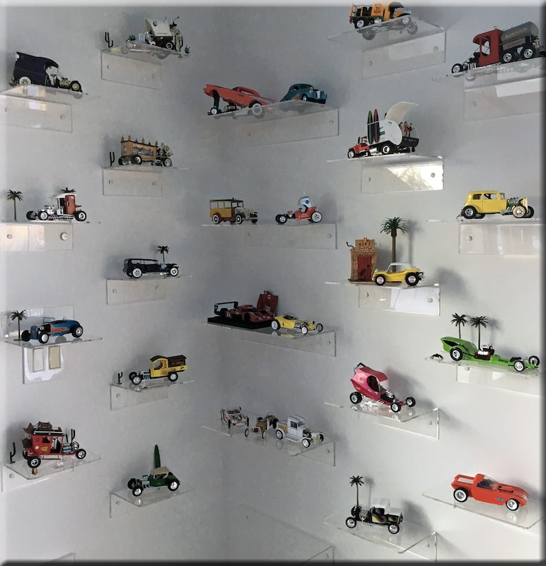Clear Acrylic Lucite Wall Mounted floating Shelves displaying organizing wall mounting cabinets kitchen bathroom home organize clutter space