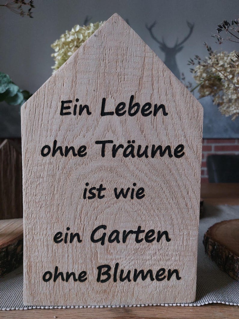 Wooden House With Saying a Life Without Dreams is Like a Garden Without