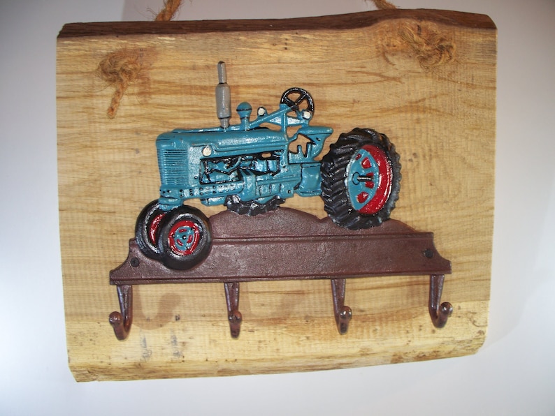 tractor in blue with 4 hangers Board