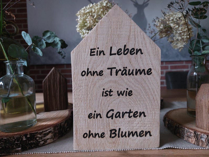 Wooden House With Saying a Life Without Dreams is Like a Garden Without