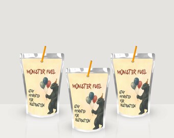May include: Three juice pouches with the text "MONSTER FUEL" and "STAY HYDRATED FOR DESTRUCTION". Each pouch features a cartoon monster holding balloons and wearing a party hat. Straws are inserted into the pouches.
