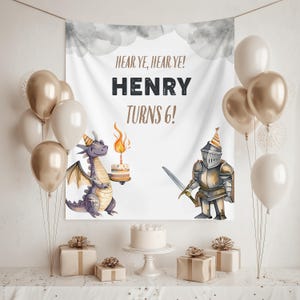 May include: A birthday party scene with a banner that reads "Hear Ye, Hear Ye! HENRY TURNS 6!". The banner features illustrations of a dragon and a knight. Balloons, gifts, and a cake complete the festive setting.