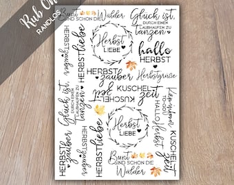 May include: A white sheet with black text and fall-themed graphics. The sheet includes phrases like "Herbst Liebe" and "Kuschel Zeit" with leaf illustrations. The words "Rub On" are in the upper left corner.