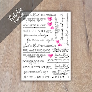 Könnte beinhalten: Rosa Aquarellherzen mit dem Text "Rub On Randlos" und verschiedenen Sätzen auf Deutsch, darunter "Hand in Hand", "Für immer und ewig", "verliebt, verlobt, verheiratet" und "Hochzeitslicht".