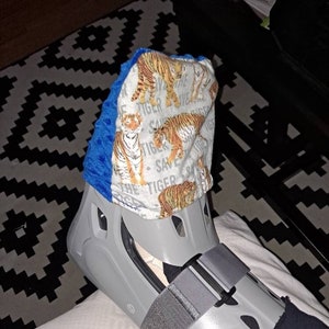 Cam boot toe cover top
