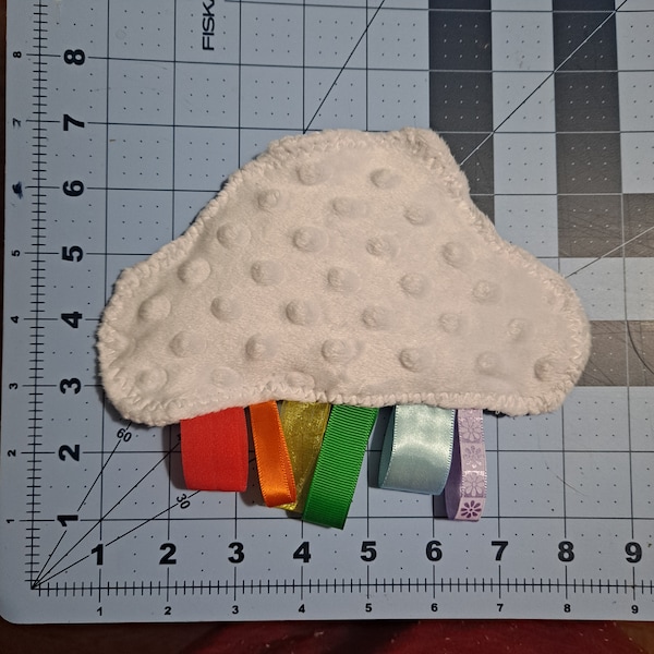 Handmade baby sensory toy; cloud shaped minky fabric; colorful loops made of ribbon; crinkle sound