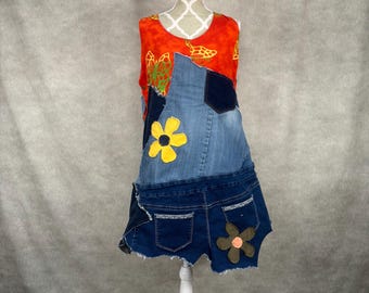 May include: A denim dress with a patchwork design featuring a red sleeveless top with a floral print, a blue denim skirt with a yellow flower applique, and a pair of blue denim shorts with a brown flower applique.