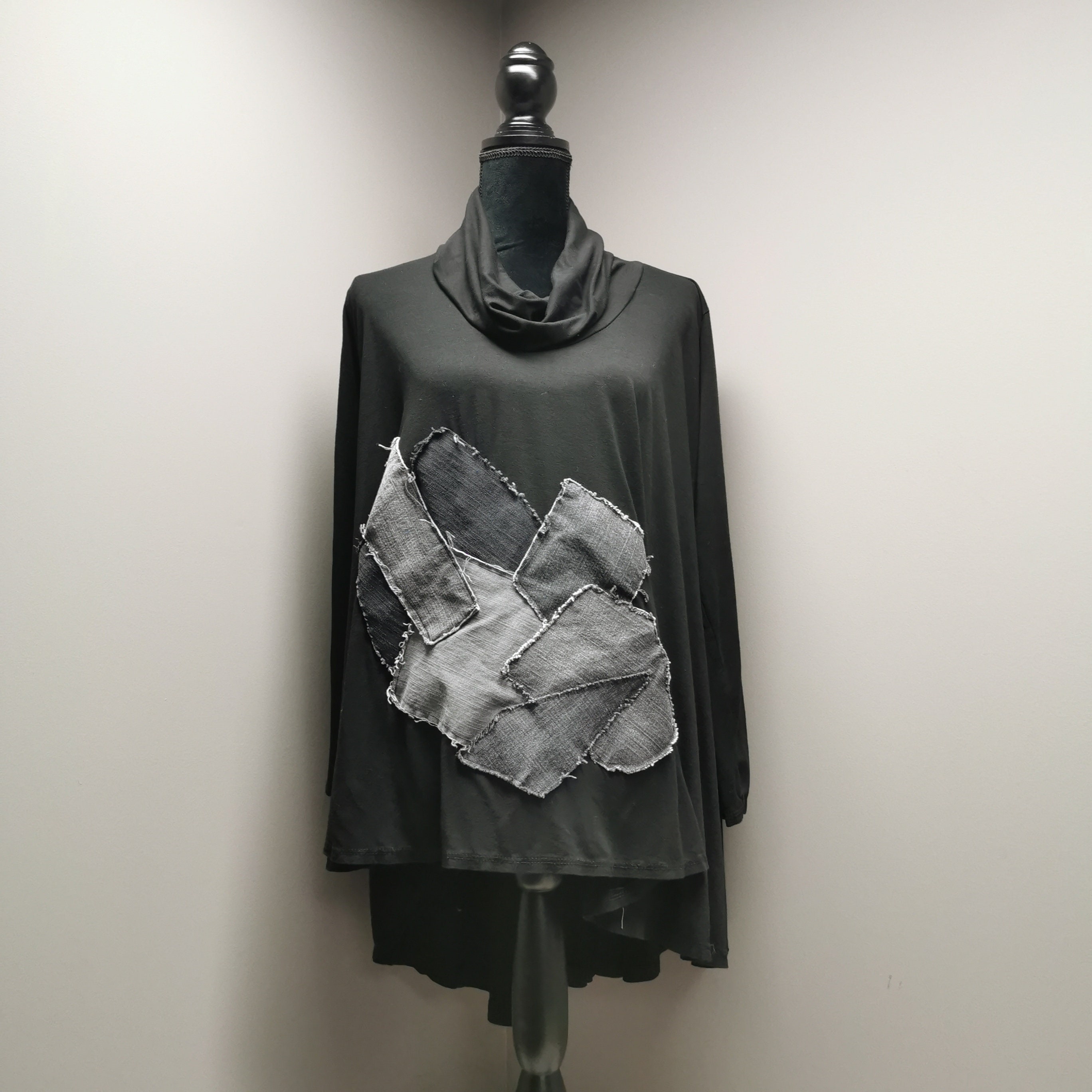 black flowy turtleneck