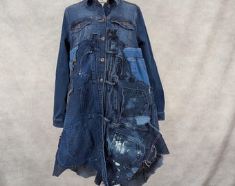 May include: A long denim jacket with a patchwork design. The jacket is made of different shades of blue denim and has a variety of pockets and stitching details.