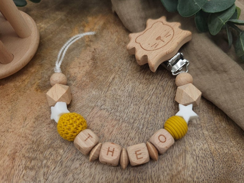 Pacifier chain with name Star Many verses Colors Senfgelb