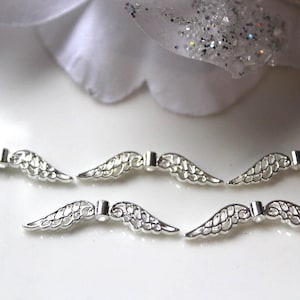 10 / 50 / 100 engelenvleugels, delicate engelenvleugels van 32 mm, metalen kralen in zilver of antiek zilver met gaatjes.