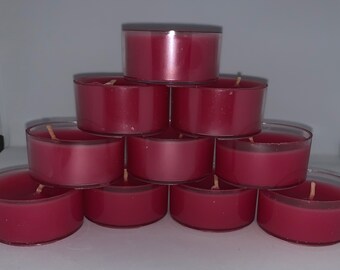 May include: A stack of ten red tea light candles in clear plastic containers.
