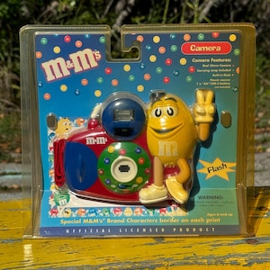 M&M  Camera Novelty New Old Stock Vintage Candy Advertisement Collectible Mars Inc 35 mm Film Border Decorated