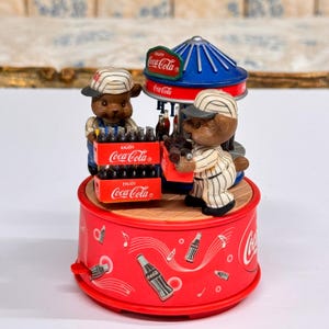 Coca Cola Busy Bottlers Musical Figurine Buy the World a Coke Vintage Enesco Baseball Animal Bear