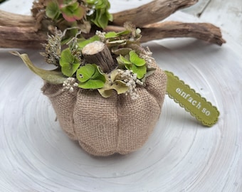 Pumpkin made from jute hydrangea flowers in the country house