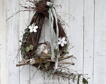 Easter wreath made of natural birch quail eggs door wreath