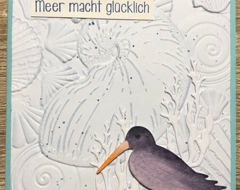 Glückwunschkarte mit Muscheln und Austernfischer