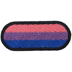 May include: Embroidered patch with a horizontal tricolor design. The patch features a pink stripe at the top, a purple stripe in the middle, and a blue stripe at the bottom. The patch has a black border and a textured appearance.