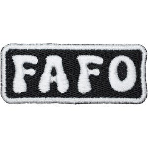 May include: Embroidered patch with the letters "FAFO" in white, stitched onto a black rectangular background. The patch has a white border.