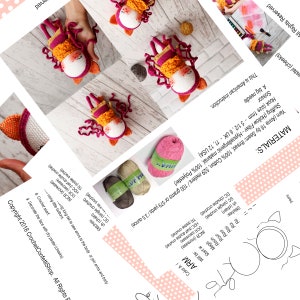 May include: A collection of handmade crochet dolls in various stages of completion. The dolls feature white faces, orange and pink accents, and curly hair. The image also includes yarn skeins and a printed instruction sheet.