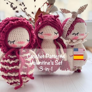 May include: Three handmade crochet dolls in a Valentine's set. Each doll has a unique design, with closed eyes and rosy cheeks. The dolls are primarily cream and burgundy, with the text "Crochet Patterns Valentine's Set 3-in-1".