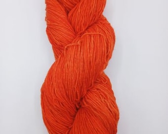 1 strand of hand-dyed sock wool, 4 ply, orange mottled, semi-solid, uni, from the creative corner