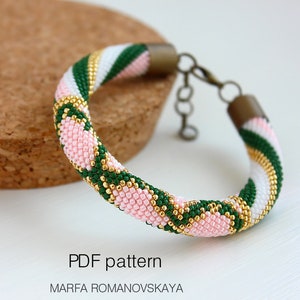 May include: A pink, white, and green beaded bracelet with gold accents. The bracelet is made with seed beads and has a clasp closure. PDF pattern.