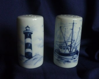 Salt and pepper shakers lighthouse and shrimp boat