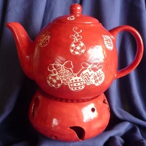 Teekanne mit Stövchen und Teeschalen. Einzelstück Bild 1