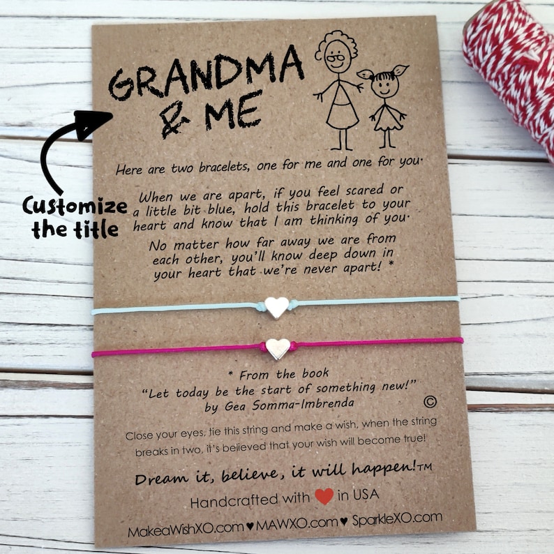 May include: Two friendship bracelets with heart charms and a card that reads "Grandma & Me". The card has a message about the bracelets and how they represent a bond between two people. The card also includes the text "Dream it, believe, it will happen!" and "Handcrafted with love in USA".