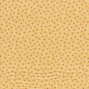 Patchwork fabric cotton in the color yellow .