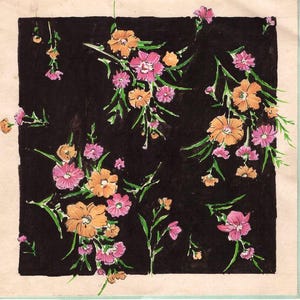 May include: A hand-painted floral design on a square of black paper. The flowers are in shades of pink and orange, with green stems and leaves. The square is bordered by a light pink and green frame. The overall theme is botanical.