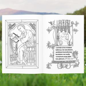 May include: Open book with black and white illustrations. One page shows a man writing at a desk, the other page has ornate floral and architectural designs with text. The background is a field of green grass and trees.