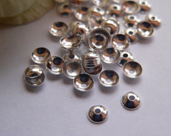 TSK061 - 50 Perlenkappen