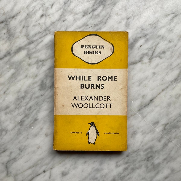 While Rome Burns bu Alexander Woollcott - vintage yellow Penguin Books paperback 118 (1937) - humor - essays - journalist