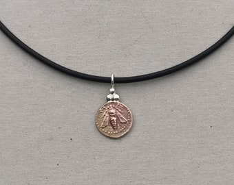 pendentif pièce de monnaie